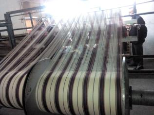 175924-Cloth being woven up